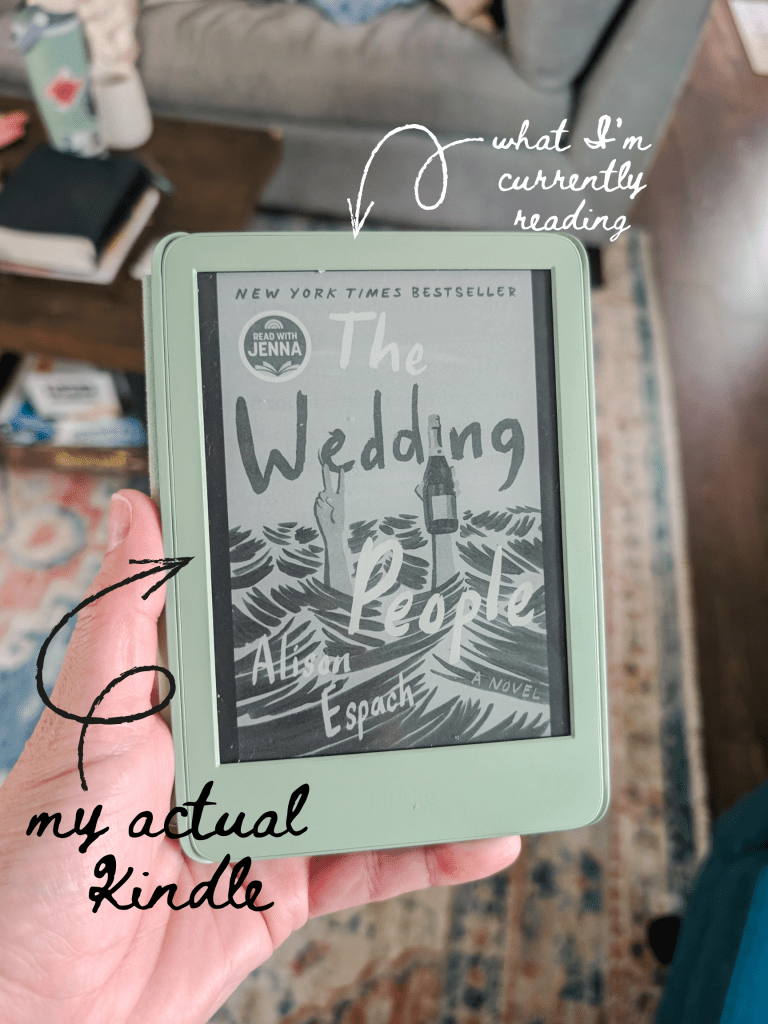 a hand holding a kindle